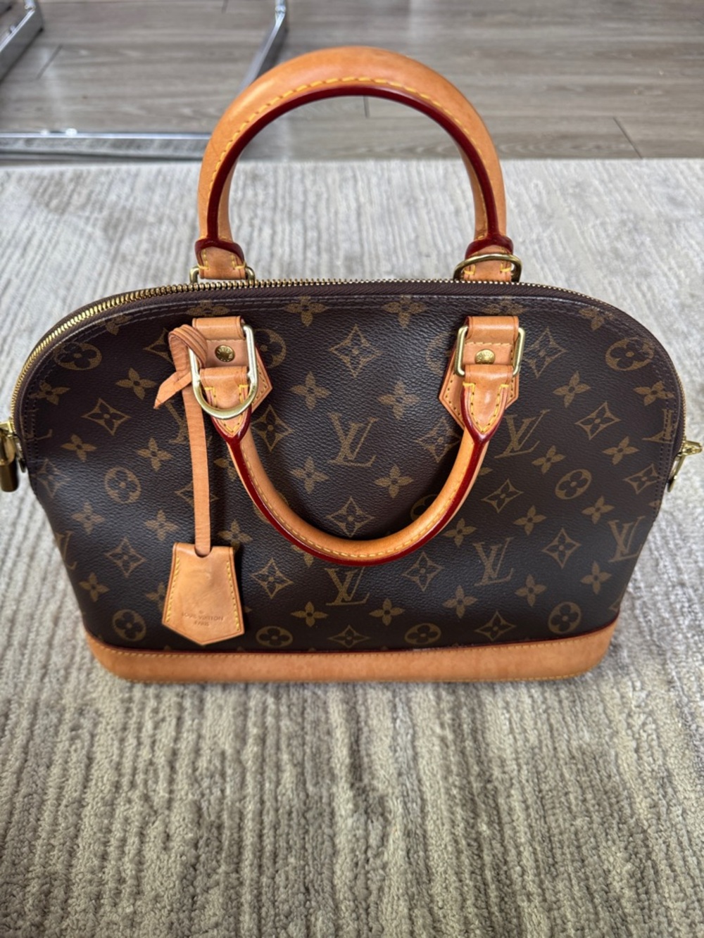 Louis Vuitton Brown Monogram Alma Satchel with Vachetta Trim